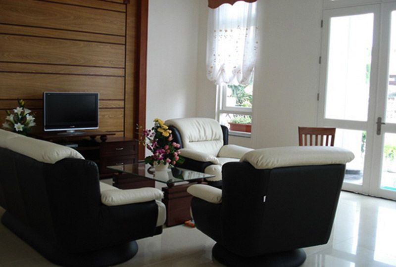 Nice villa located at Thao Dien Compound in District 2 now available for rent .