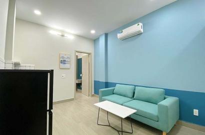Bright serviced apartment for lease in District 3 next to Le Thi Rieng Park