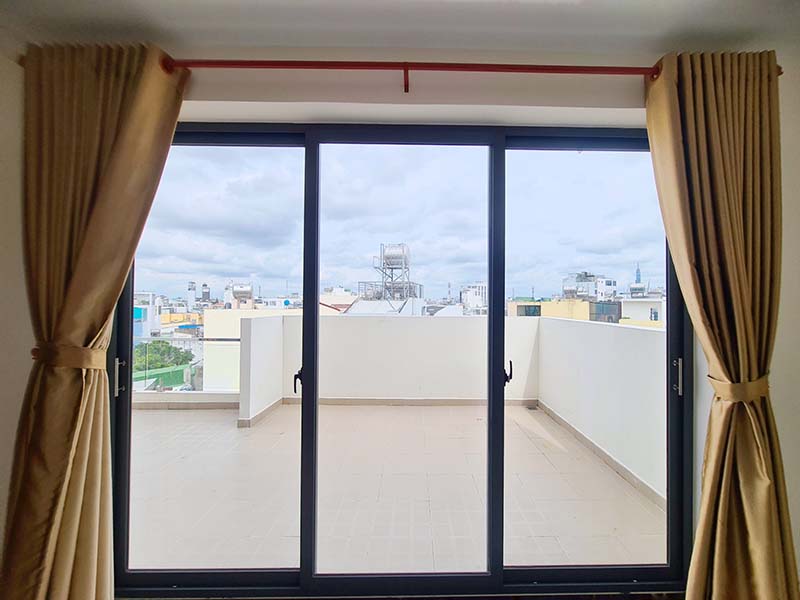 Bright rooftop serviced apartment for rent on Nguyen Van Dau Street Binh Thanh District.
