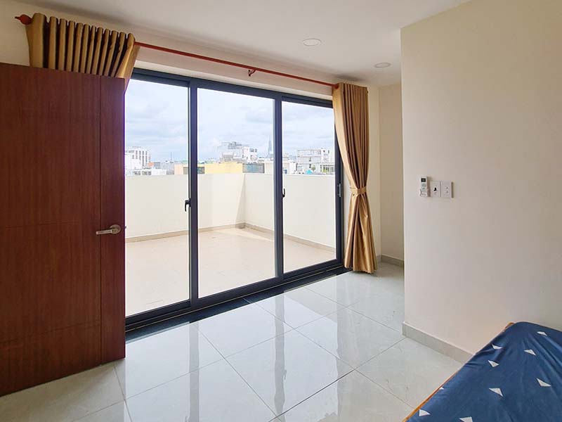 Bright rooftop serviced apartment for rent on Nguyen Van Dau Street Binh Thanh District.